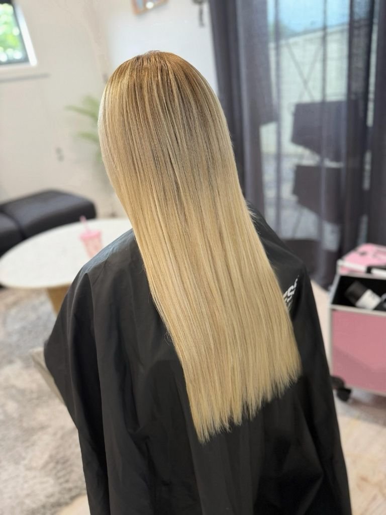 Beautiful blonde hair styled for women at a hair salon in Sydney.