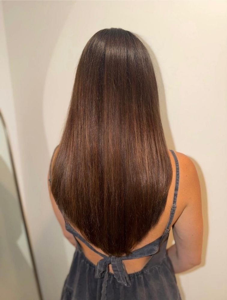 Beautiful long straight brown hair, perfect for quick styling or hair emergencies.